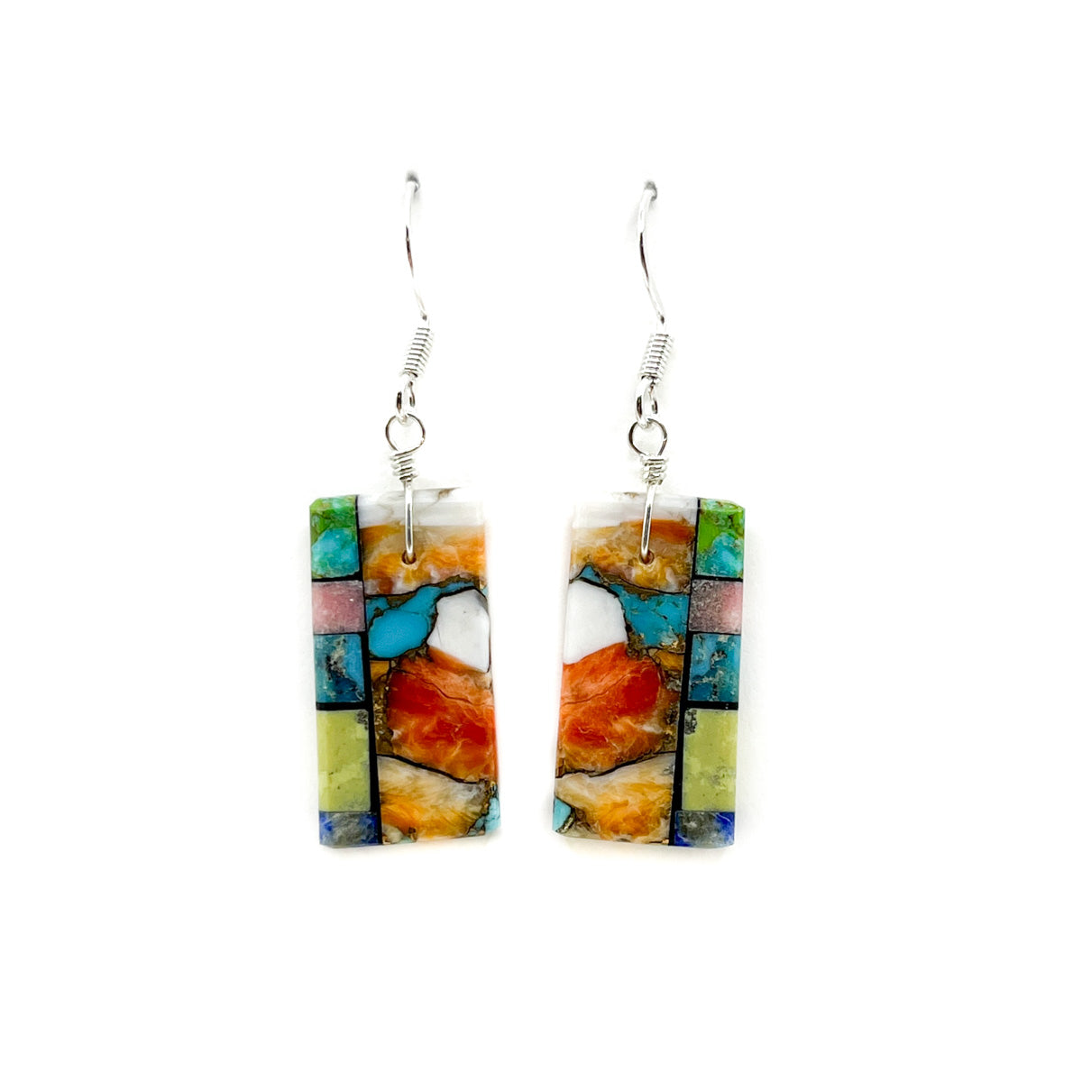 Colorful rectangular earrings on a white background