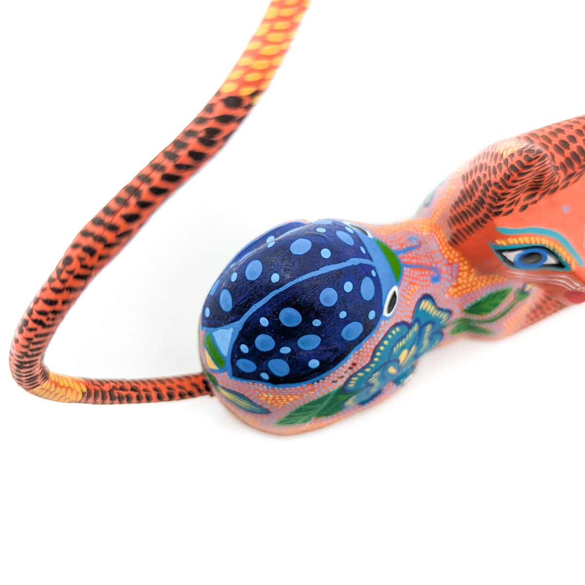 Orange Reclining Cat with Lady Bug