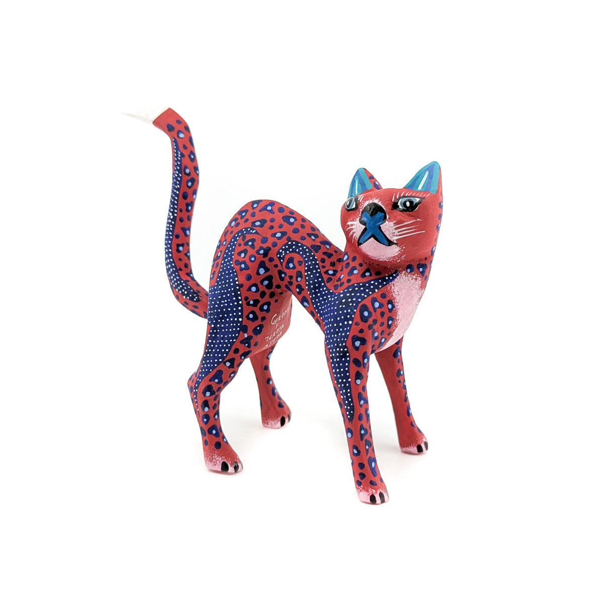 Red and Blue Arched Back Cat
