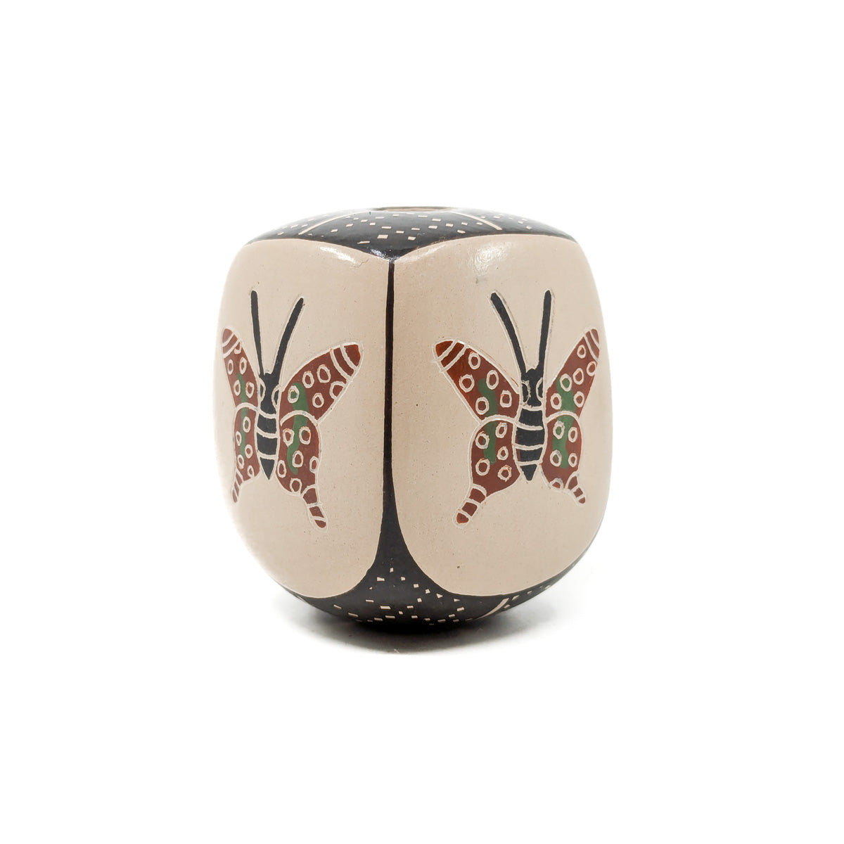 Handcrafted pot by Mata Ortiz artist&nbsp;Luz Elva Gutierrez
Measures approximately 2.25 inches high x 2.5 inches in diameter at widest circumference
Mata Ortiz is a small village in the state of Chihuahua, Mexico, less than 100 miles from the US-Mexico border. The pueblo has a population of approximately 2,000 people and is within the municipality of Casa Grandes in a wide fertile valley, which has long been inhabited by indigenous people. The ancient ruins of Casas Grandes are located nearby