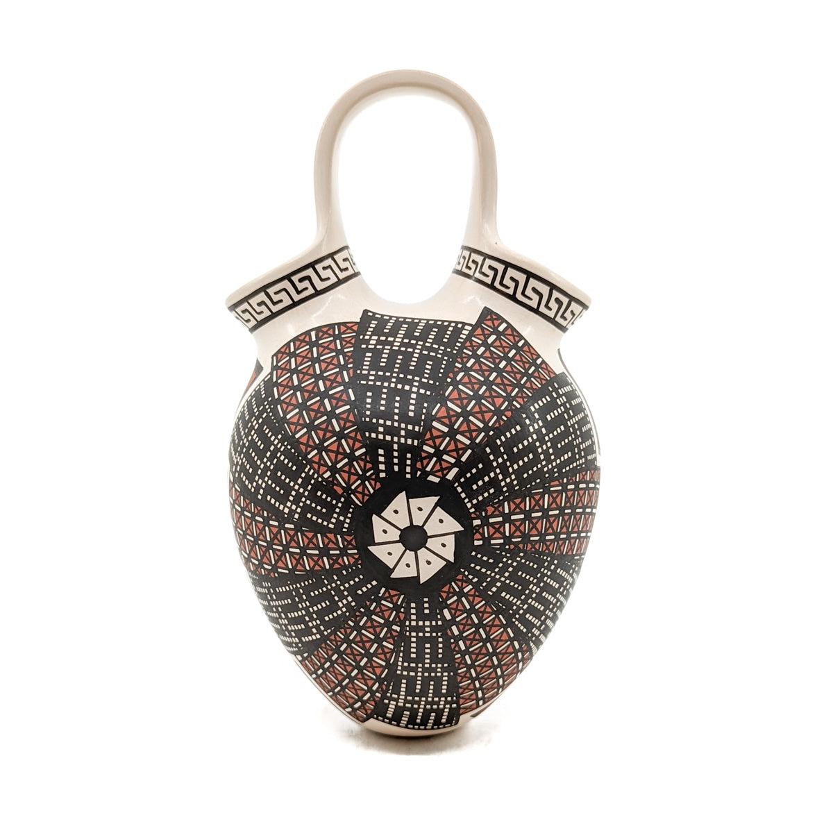 Handcrafted pot by Mata Ortiz artist, Mirna Hernandez Measures approximately 7.5 inches high x 4 inches in diameter at widest circumference Finely painted red and black geometric designs on white clay