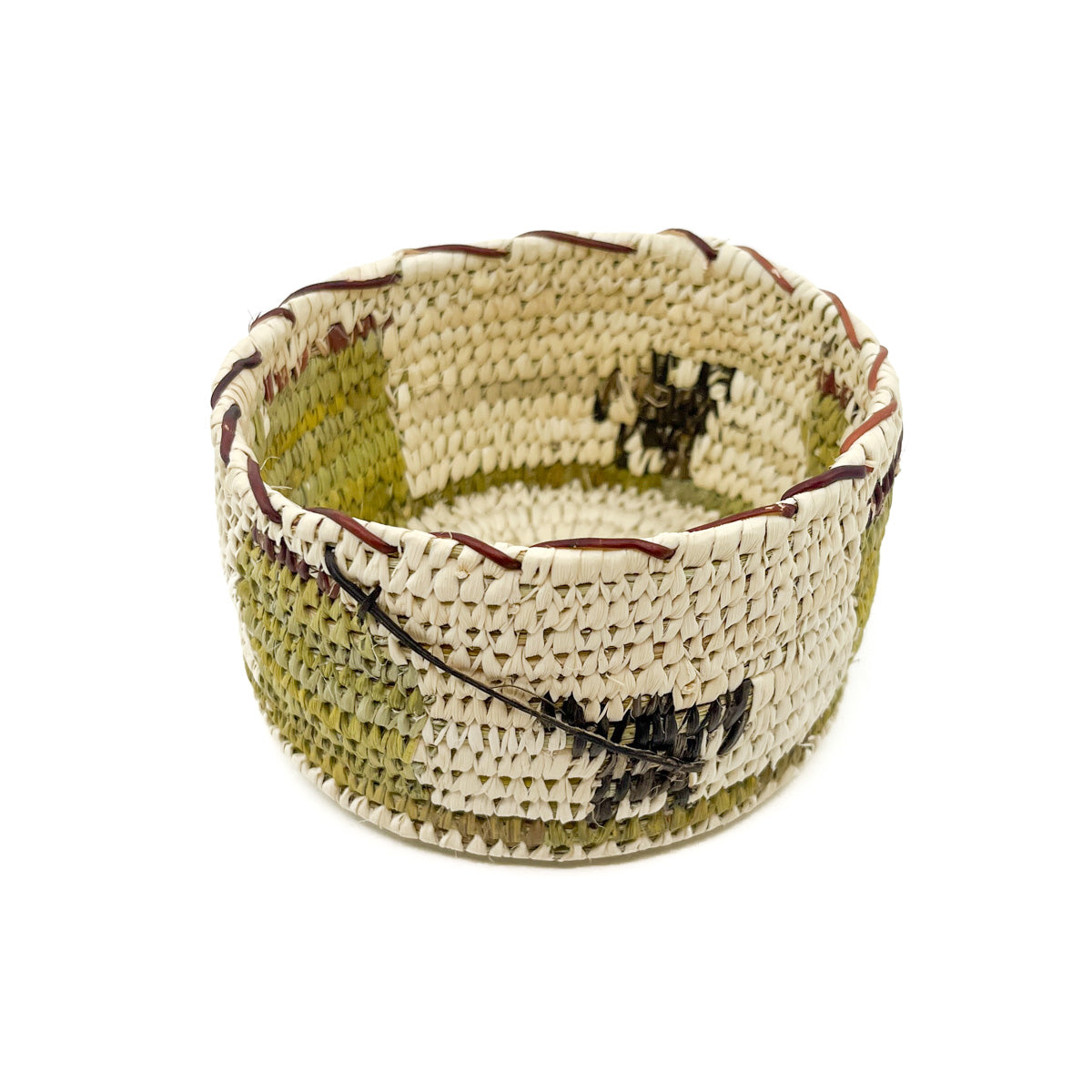 Handwoven basket by Tohono O'odham artist, Julia Lewis
Measures approximately 2.5 inches high by 4.5 inches in diameter&nbsp;
Native plant materials hand gathered from the Sonoran Desert include Beargrass, sun bleached Soaptree Yucca, unbleached green Soaptree Yucca, rare red Yucca Root, and black Devil's Claw
Keep away from sunlight to maintain color variations
