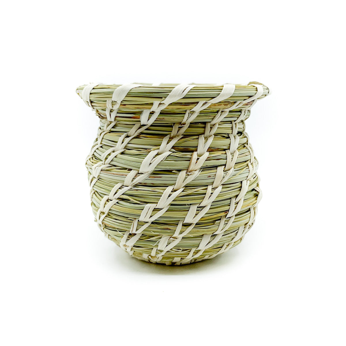 This handwoven round basket is by Char Molisto and measures approximately 4 inches in diameter and 4 inches high.  Plant materials are hand gathered from the Sonoran Desert for basket weaving. The interior green coils (warp) are native Beargrass and the white stitches (weft) woven around the coils are sun-bleached Soaptree Yucca.