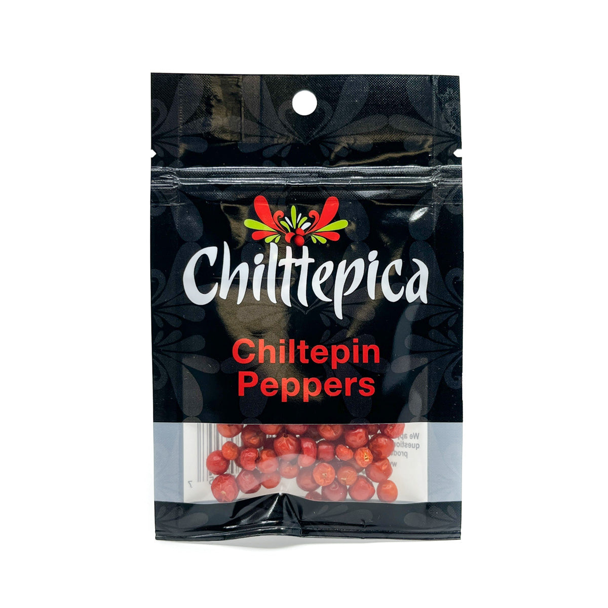 Packaging of Chilttepica Chiltepin Peppers with visible peppers inside.