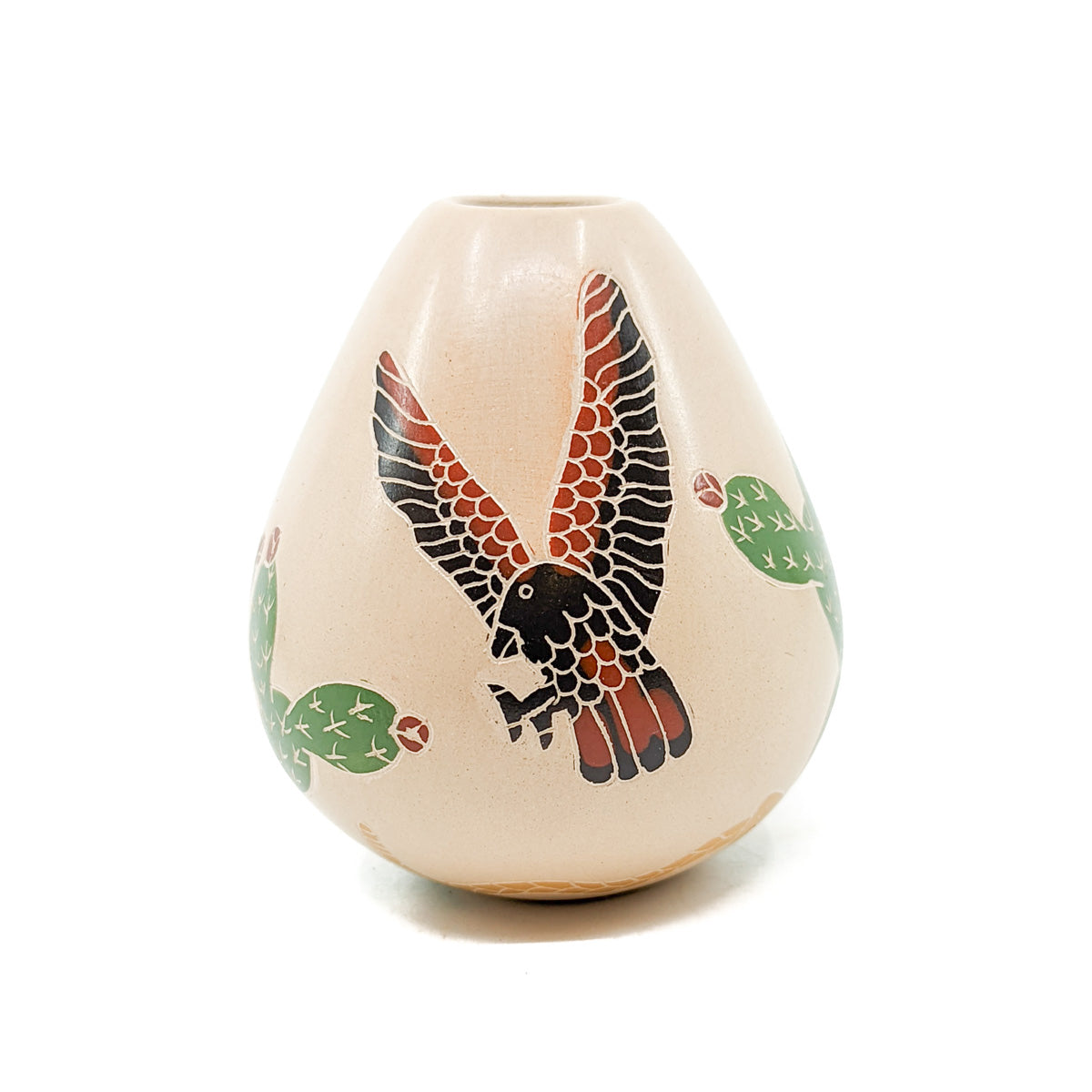 Handcrafted pot by Mata Ortiz artist, Joel Corona
Measures approximately 3 inches high x 2.75 inches in diameter at widest circumference
Black, red, and green paint on white clay