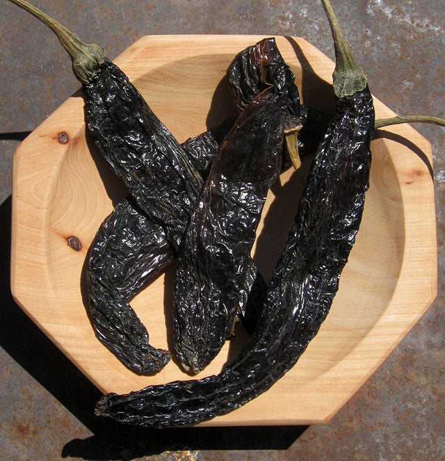Chile pasilla in western Mexico is sometimes called chile negra. Adds an interesting taste and color to standard red chile enchilada sauce. 1.5oz package