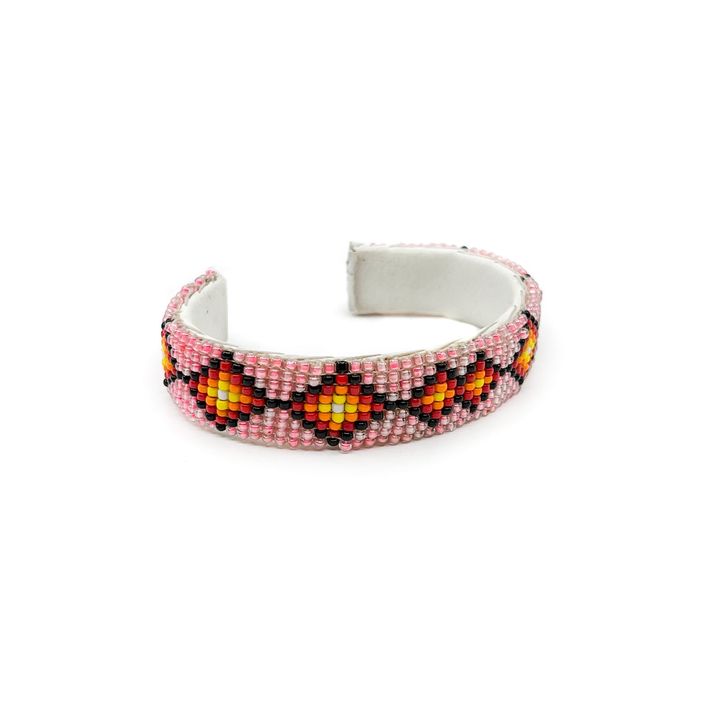 Navajo loom beadwork bracelet sewn onto leather&nbsp; Beautiful craftsmanship, colorful pattern with a geometric motif Measures approx. .50 inches wide and 6 inches around plus a 1.25 inch opening&nbsp; Bracelet is slightly flexible and will accommodate a 7.5 to 8 inch wrist (medium size)