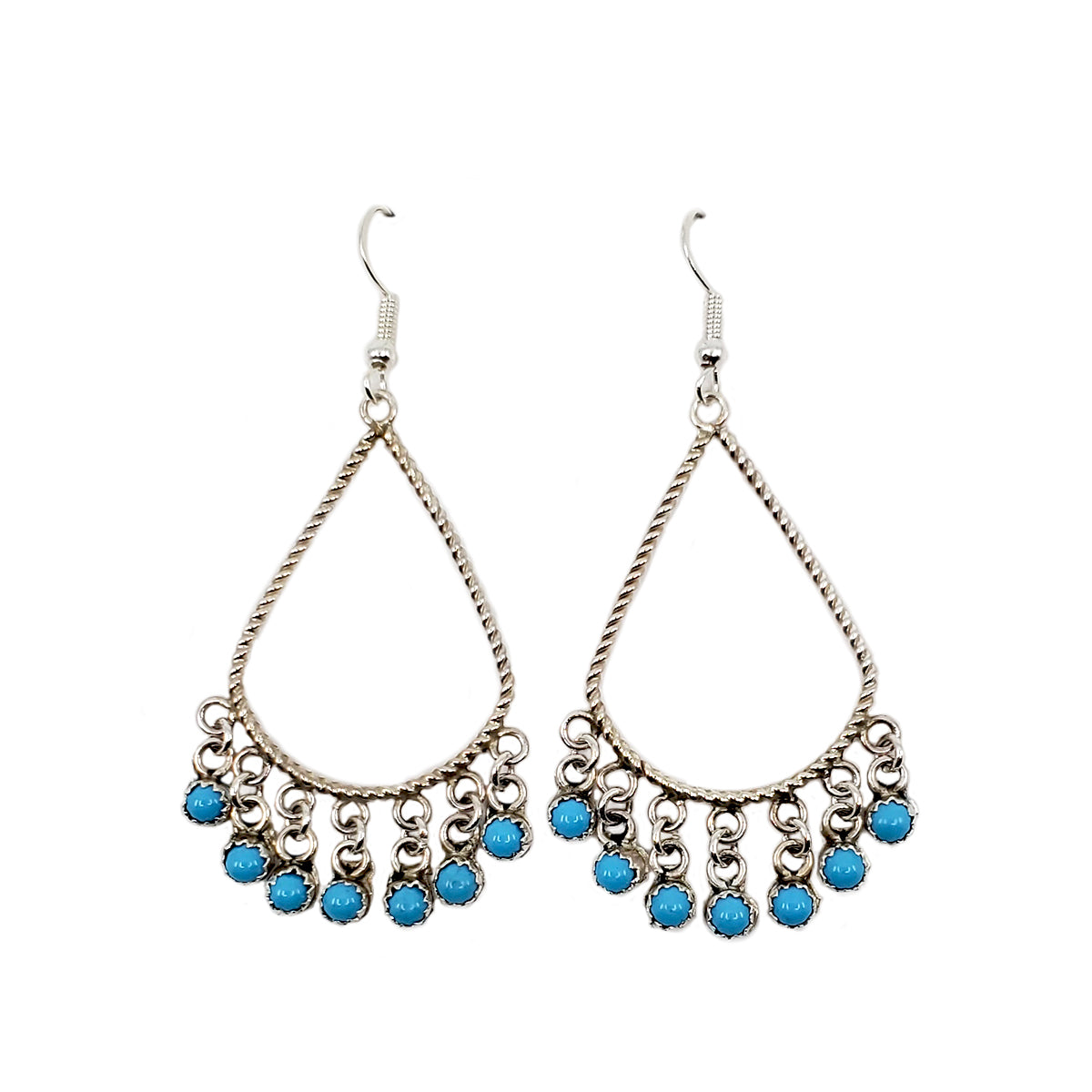 Turquoise dangle earrings, by Sylvia Chee, Diné silversmith Sterling silver twisted wire tear drop shape with 7 stones dangling on each earring Earring measures approximately 2 inches long and 1 inch wide at the bottom Dangles from earlobe approximately 2.5 inches Sterling silver wires and findings