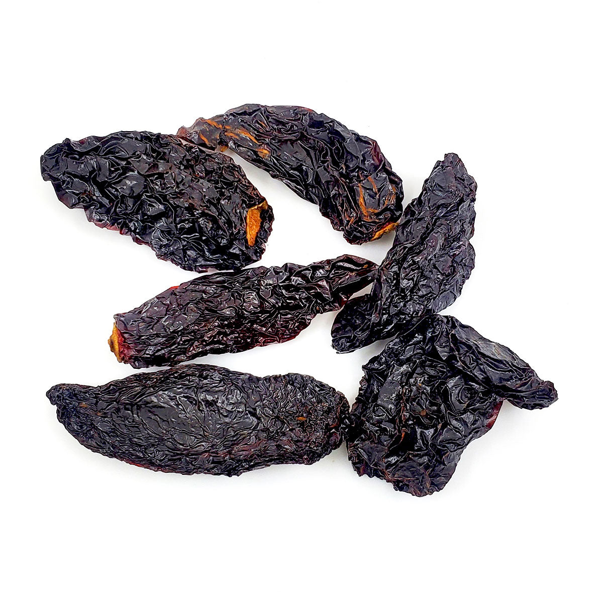 These dark purple-red smoked jalapeños come from the state of Chihuahua in Mexico and are said to be smoked longer than the brown chipotles. Mild to medium hot. 1.5oz package.