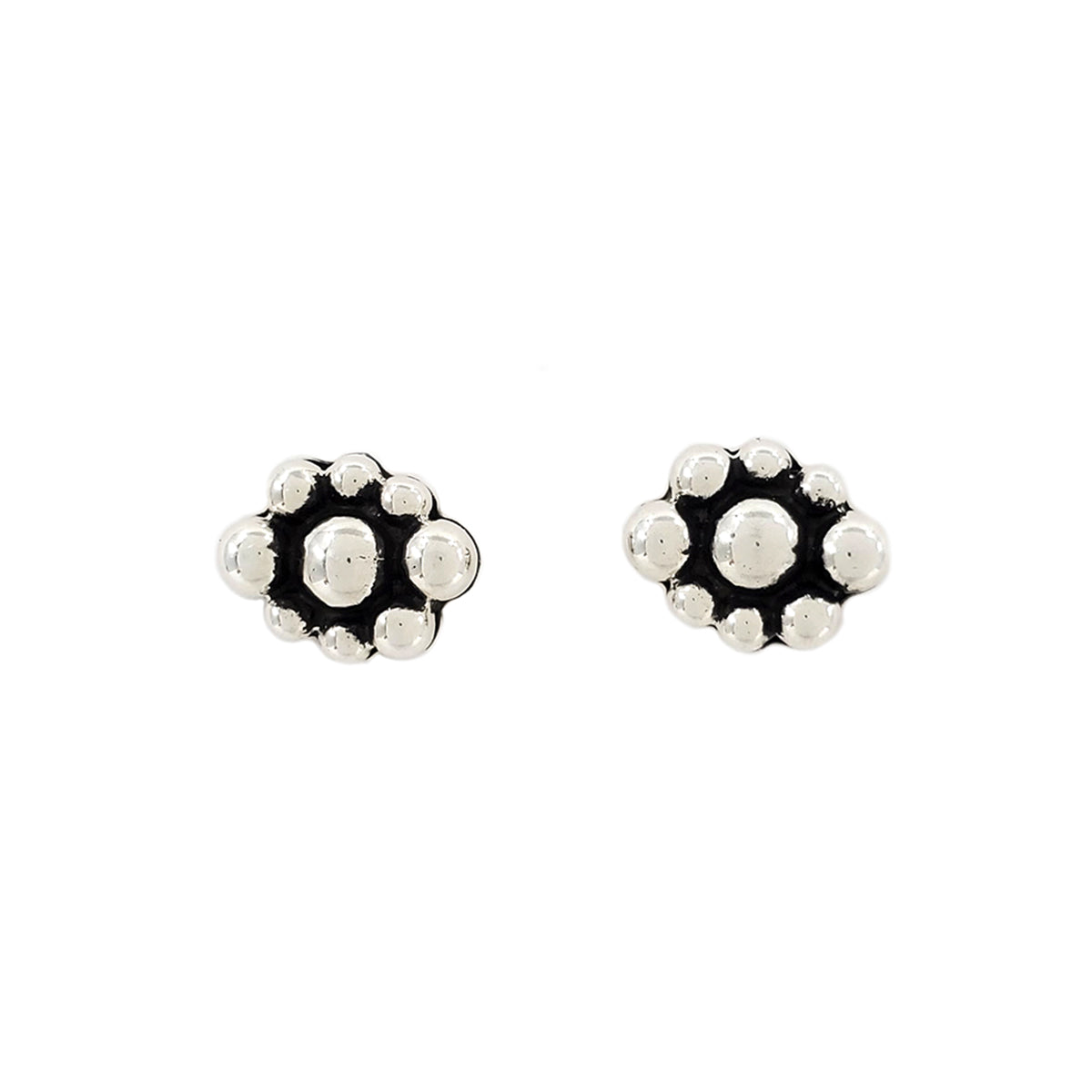 Sterling silver, heavy gauge, beaded stud earrings by Raymond Coriz, Diné silversmith Each earring measures approx .25 inches in diameter Sterling silver posts and backs