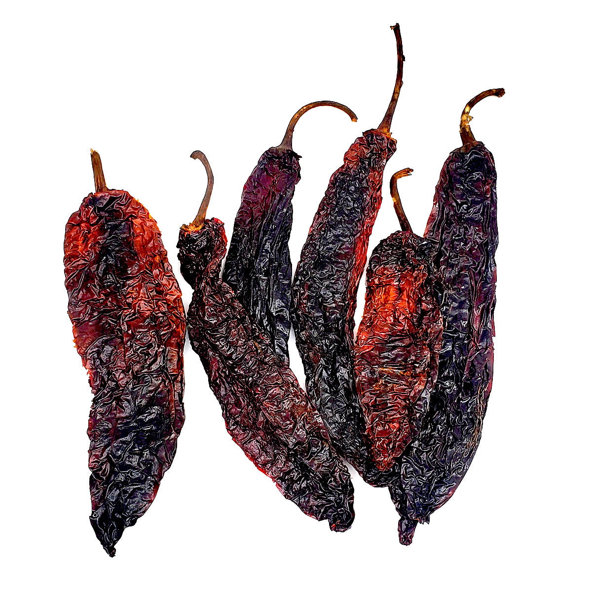 Whole dried chiles only found in the Oaxacan region. This is a smoky, dark red chile that has a wonderful aroma, and a pungent fruit flavor. Excellent when cooked with beans and posole. Staff favorite! 1.5oz package